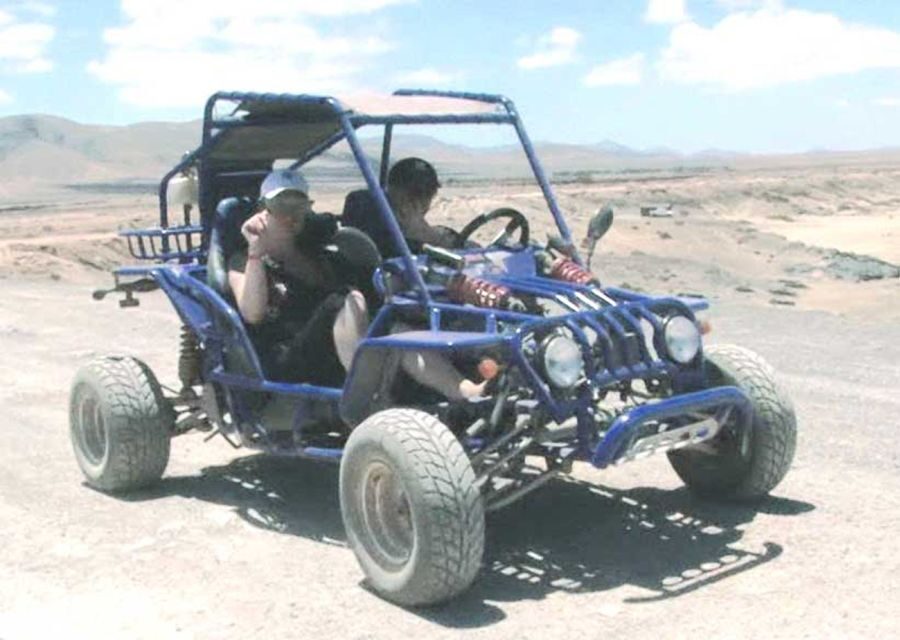 Caleta De Fuste: Guided Buggy Explorer Tour - Entering Caleta de Fuste Pickup Mode and the Safety Briefing