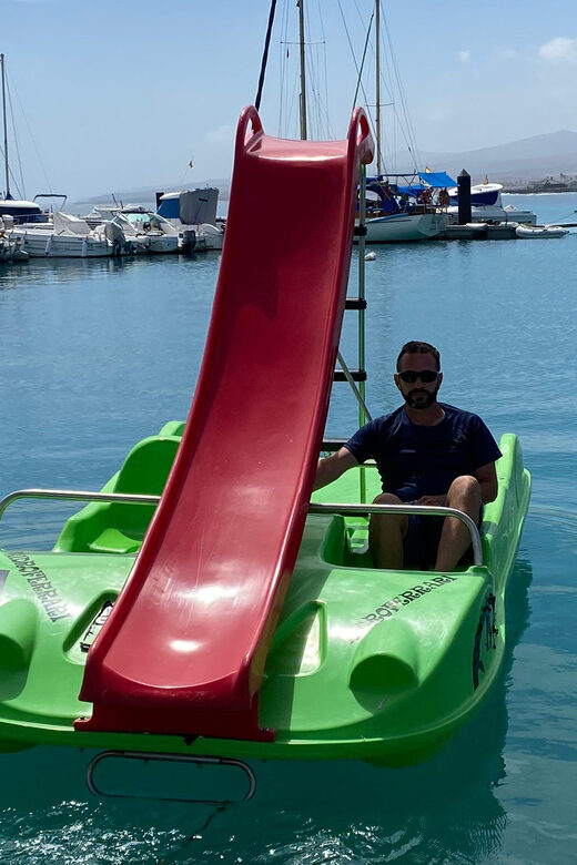 Caleta de Fuste: Pedalo with slide rental - Practical tips: wind, sunscreen, and climbing back on