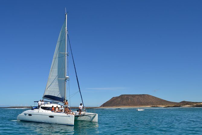 Exclusive Sailing Catamaran Experience to Lobos Island with lunch - Snorkel, kayak, and stand-up paddleboard: fun built into the schedule