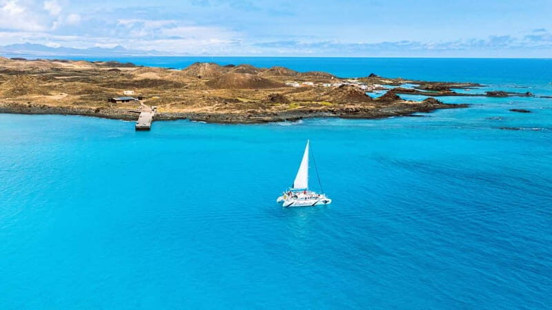 Lobos Island: 4-Hour Catamaran Trip with Lunch - Getting On Board in Corralejo: Celia Cruz and Optional Pickup
