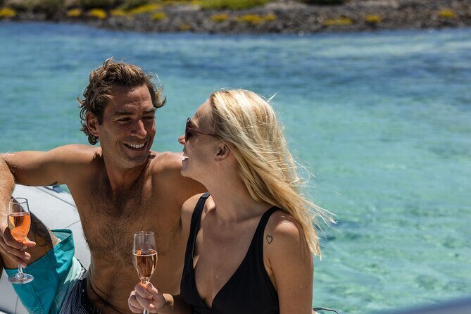 Lobos Island Half-Day Sailing Tour with Lunch - The Lobos sail-by: lighthouse, volcano, and the smaller island details