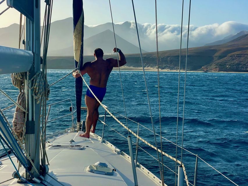 Morro Jable: Sailing Boat Excursion with Food and Drinks - The swimming and snorkeling stops: what to expect once anchored