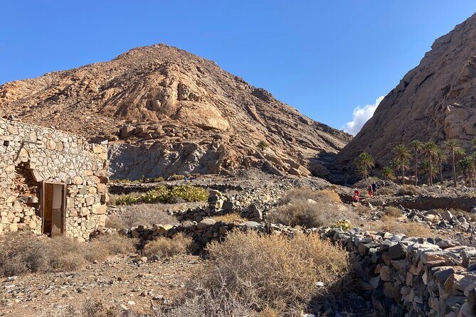 Wild coast nature experience and legends - Ajuy Coast: From Rough Shore Paths to a Black Beach Rock Gate